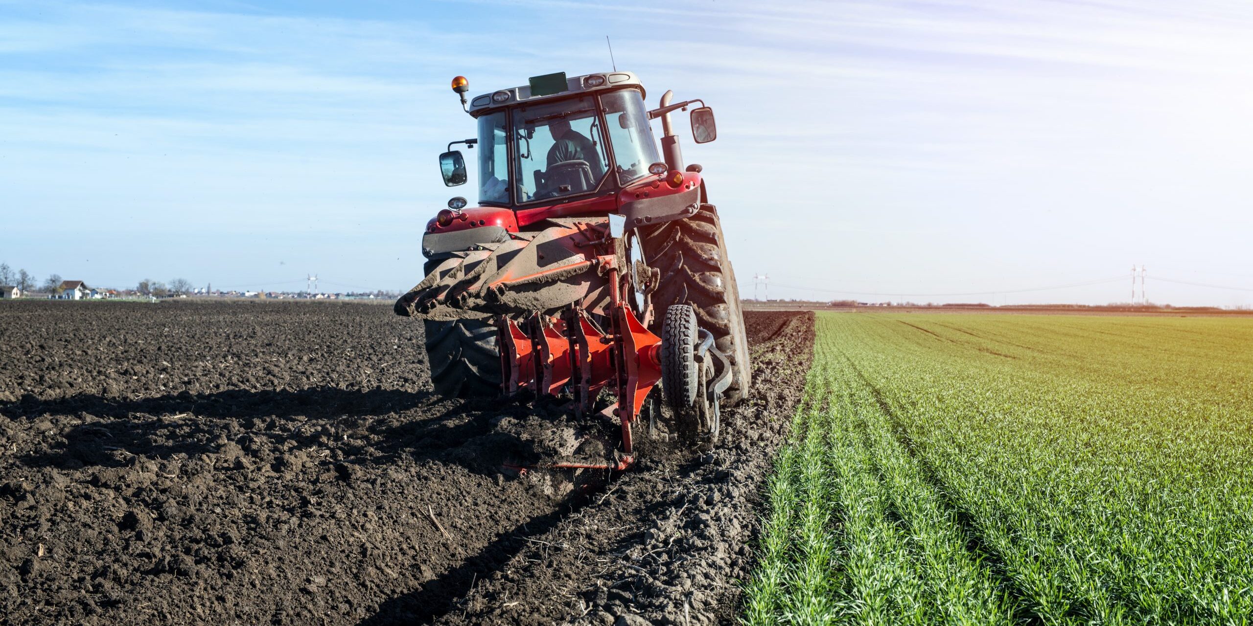 Tractor agricultural machine cultivating field. Tractor agricultural machine cultivating field.